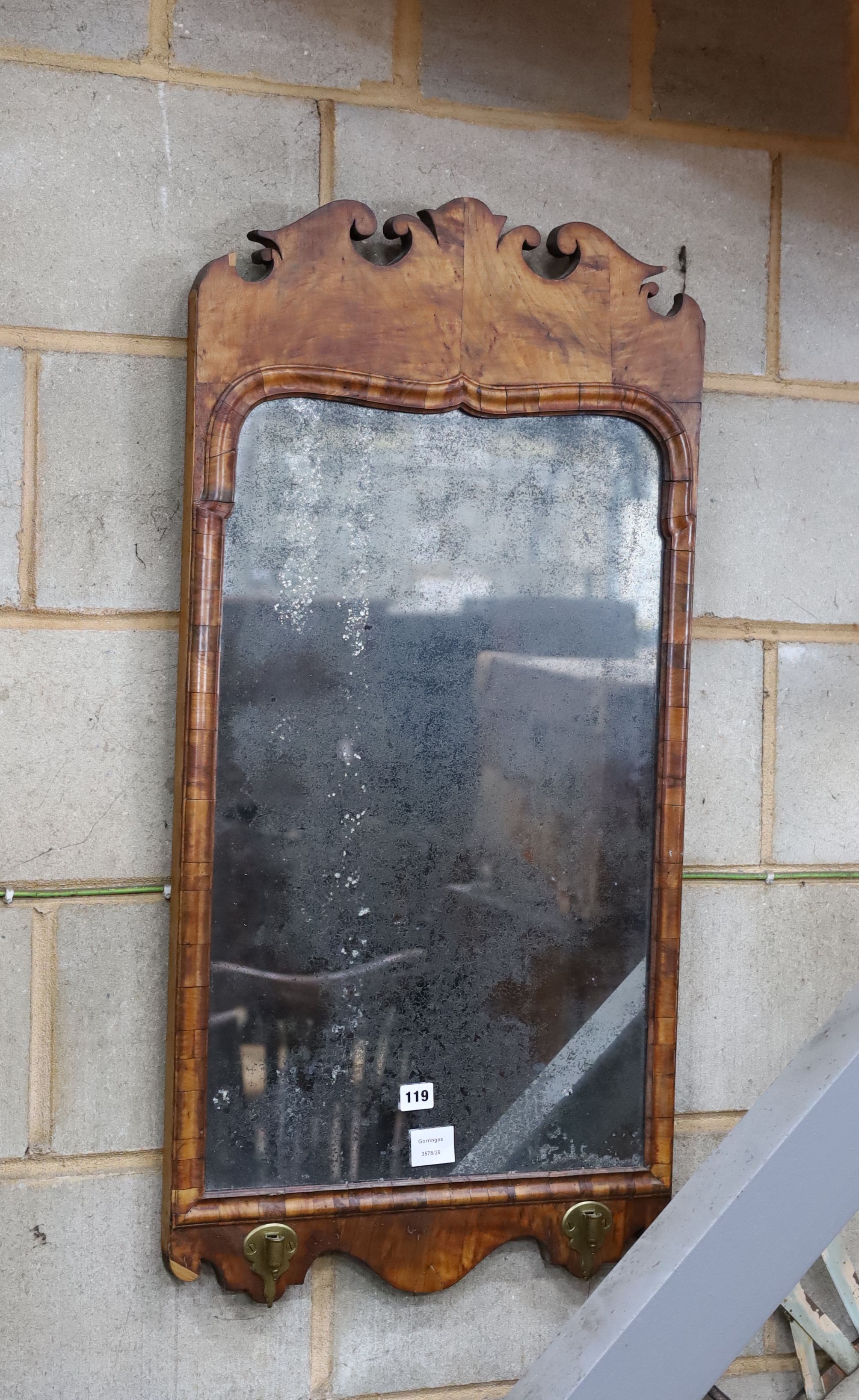 An 18th century walnut fret cut wall mirror, width 48cm, height 96cm